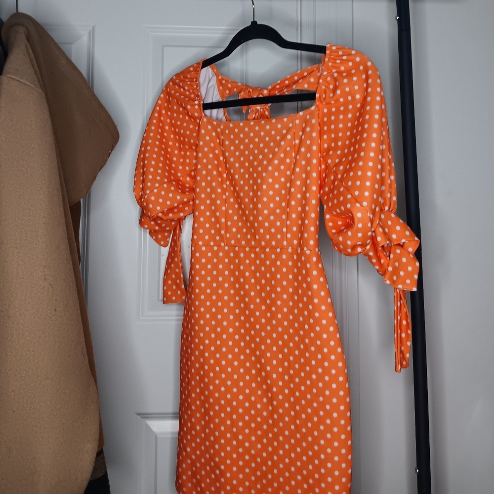 Orange and white polkadot dress